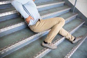 man-on-stone-steps-after-a-slip-and-fall-accident